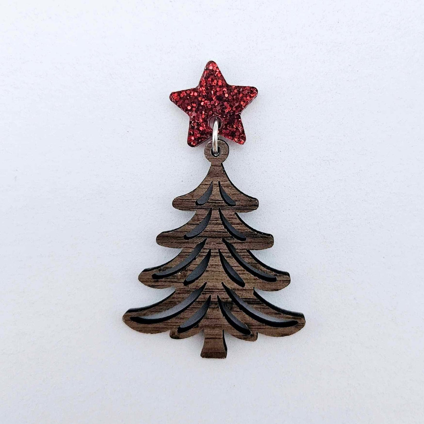 One 14mm red glitter star topper paired with a walnut Christmas tree dangle to show how it can be used in a festive earring design