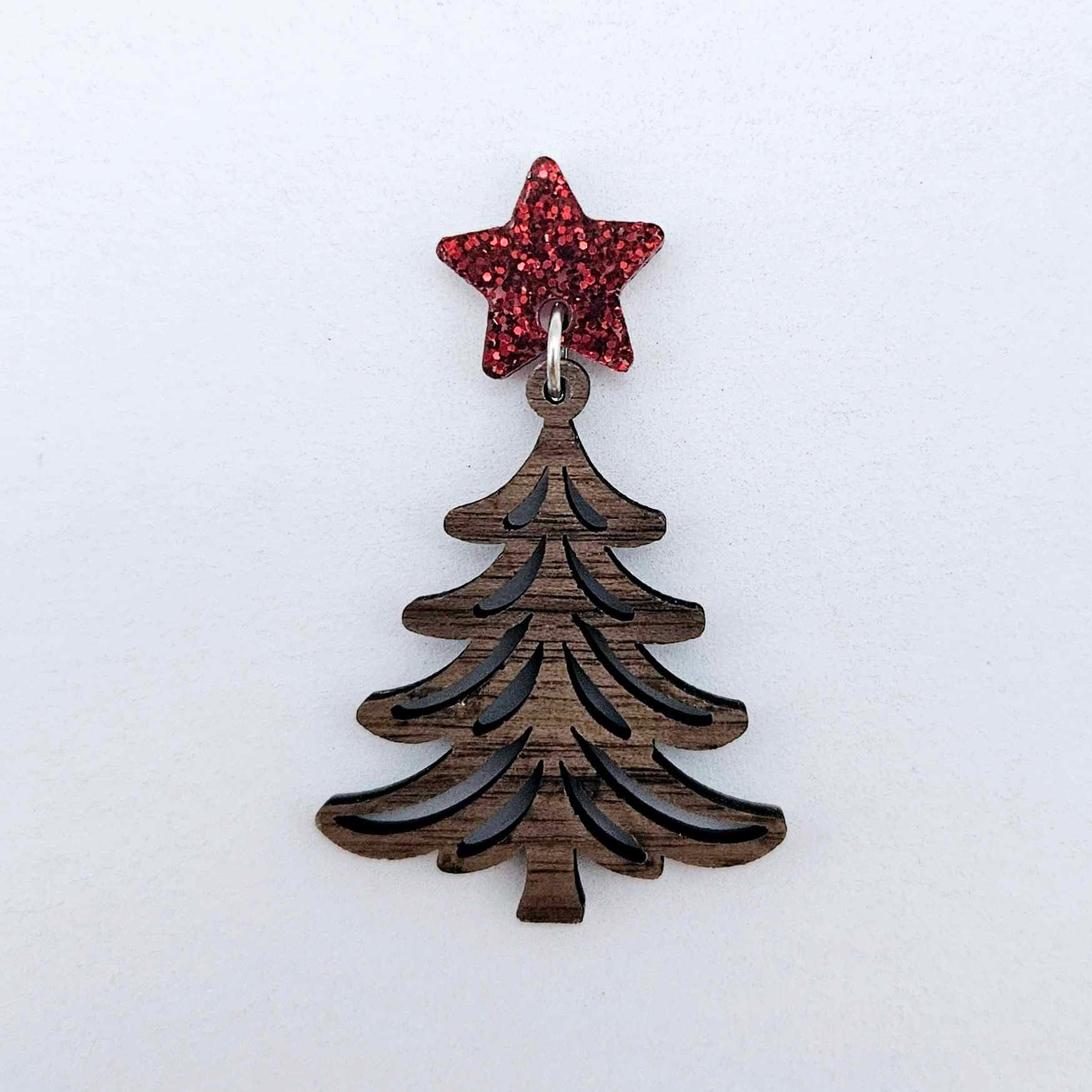 One 14mm red glitter star topper paired with a walnut Christmas tree dangle to show how it can be used in a festive earring design