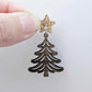 One 14mm rose gold glitter star topper paired with a walnut Christmas tree dangle to show how it can be used in a festive earring design
