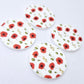 Two pairs of 32mm Poppy UV printed circle dangle earring blanks featuring detailed red poppies and green foliage on white acrylic laying flat.
