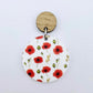 One 32mm Poppy UV printed circle dangle blank assembled with a 14mm oak topper to show how it can be used in a finished earring design.