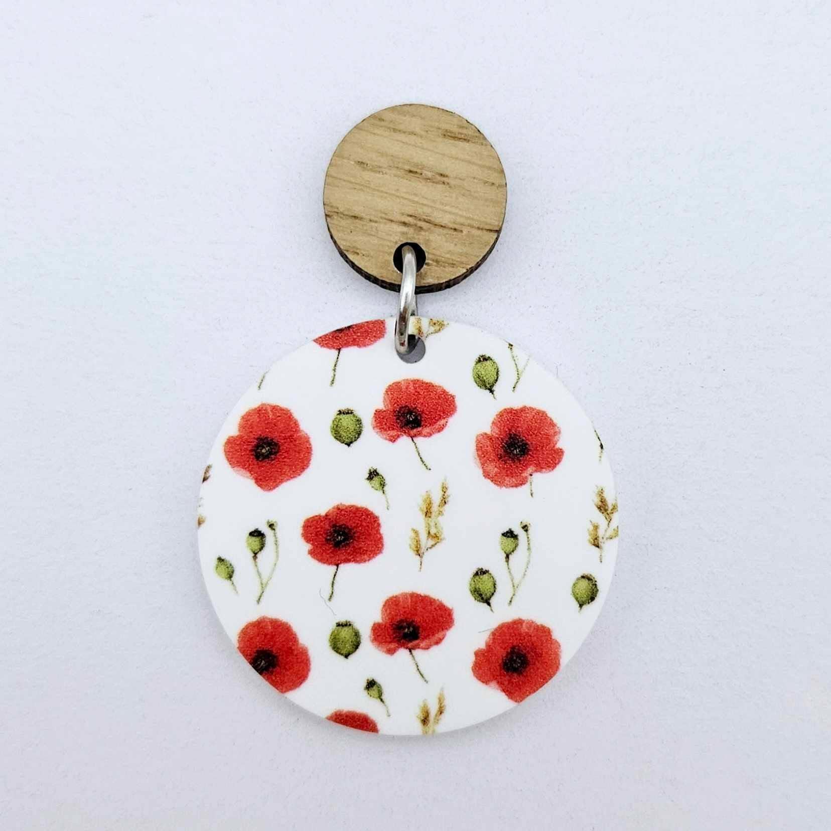One 32mm Poppy UV printed circle dangle blank assembled with a 14mm oak topper to show how it can be used in a finished earring design.