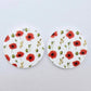 One pair of 32mm Poppy UV printed circle dangle earring blanks featuring vibrant poppy blooms and green foliage on white acrylic laying flat.