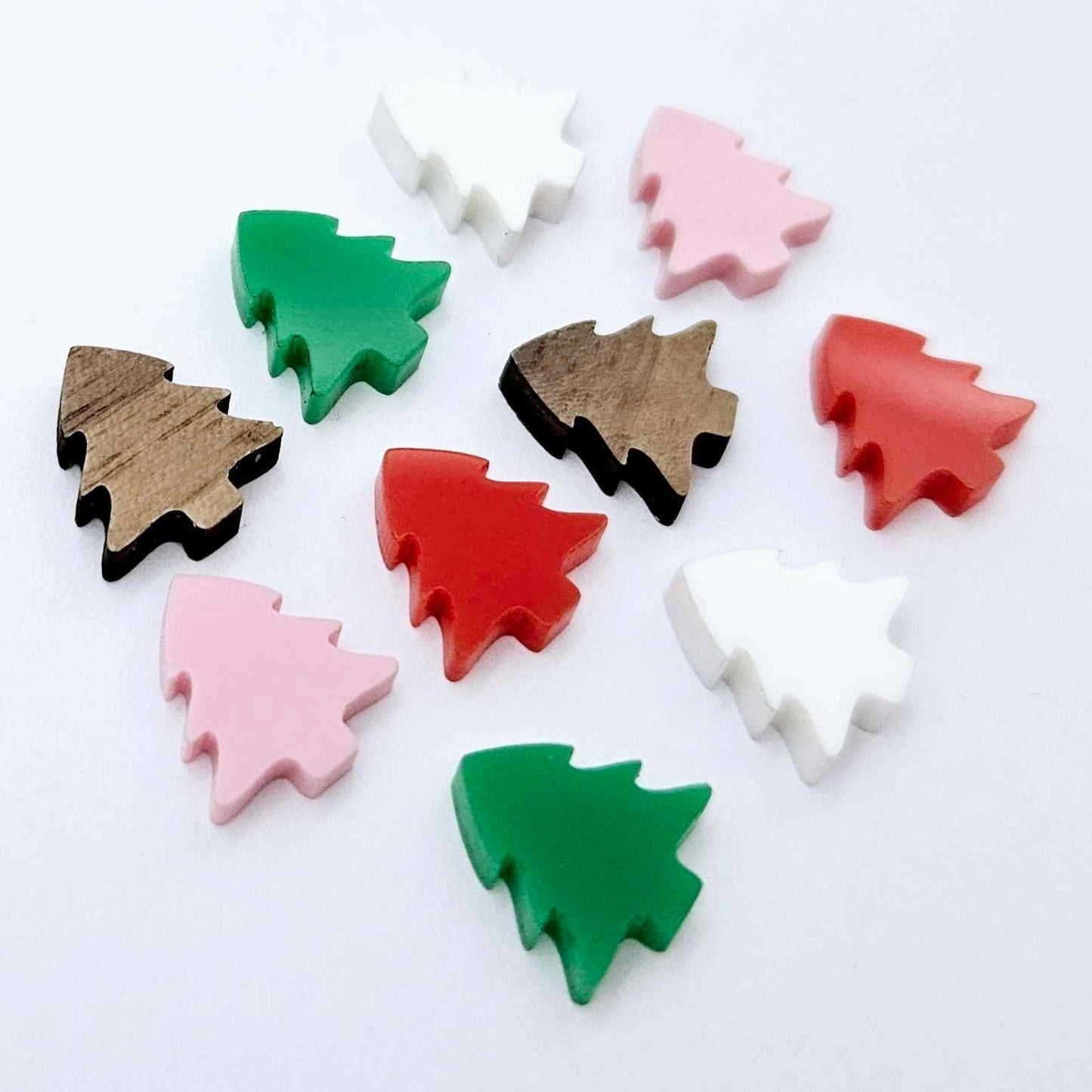 12mm mini Christmas tree stud earring blanks in five traditional solid colours laying flat