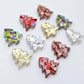 12mm mini Christmas tree stud earring blanks in five chunky glitter colours laying flat