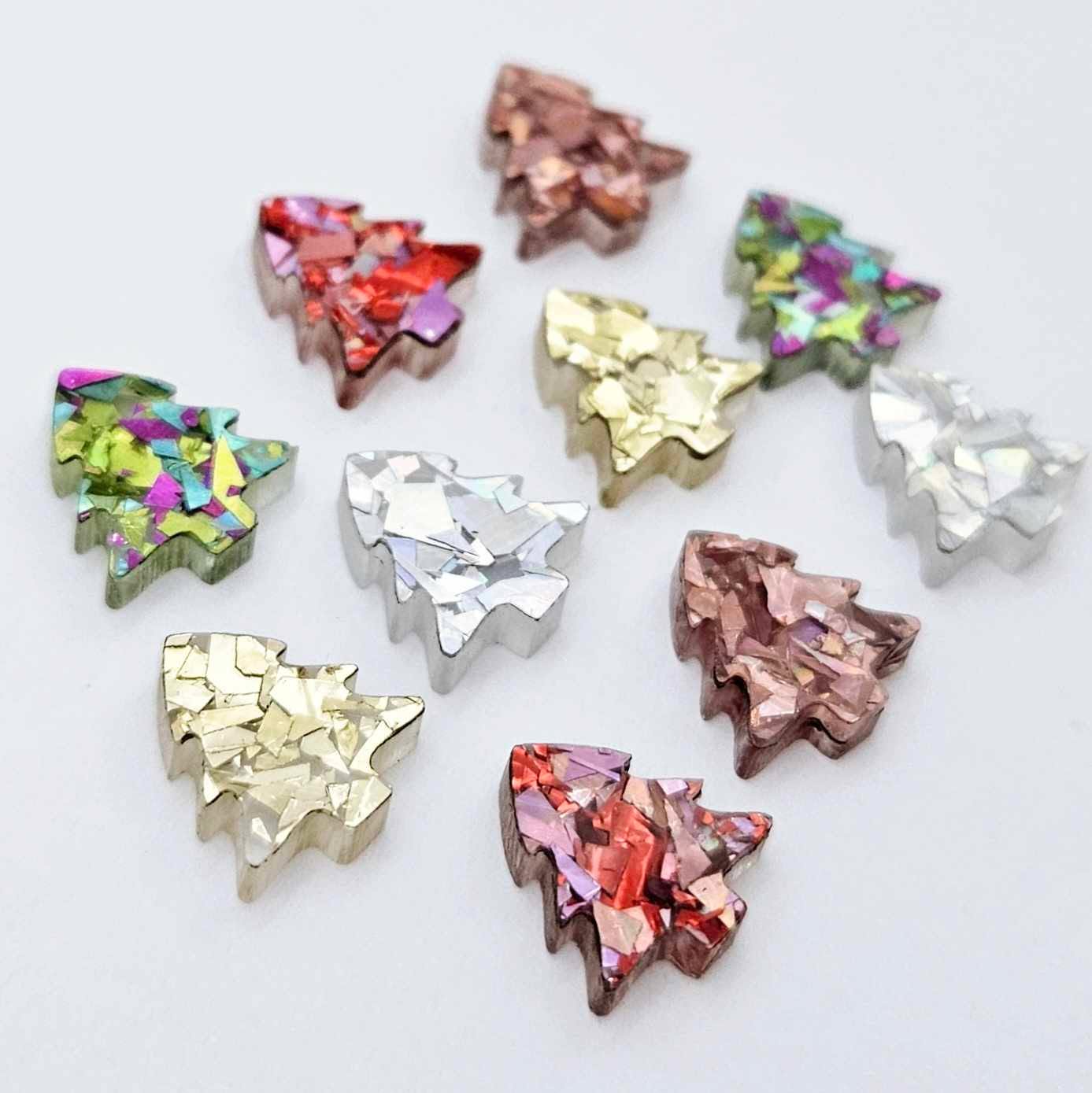 12mm mini Christmas tree stud earring blanks in five chunky glitter colours laying flat