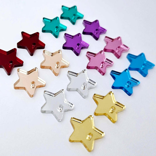 16mm mirror acrylic star earring toppers in gold, silver, rose gold, red, green, purple, pink and light blue, with one pair of each colour laid flat together.