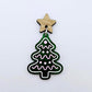 16mm oak veneer star topper assembled with a Christmas tree cookie earring dangle, showing how the topper can be used in a finished earring design.