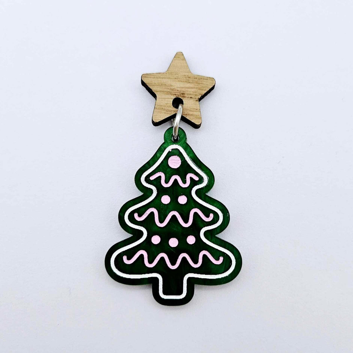 16mm oak veneer star topper assembled with a Christmas tree cookie earring dangle, showing how the topper can be used in a finished earring design.
