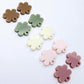 Warm Neutrals flower topper mixed pack showing one pair of each colour with holes, including dusty rose, strawberry milkshake, cream, iced coffee and olive green