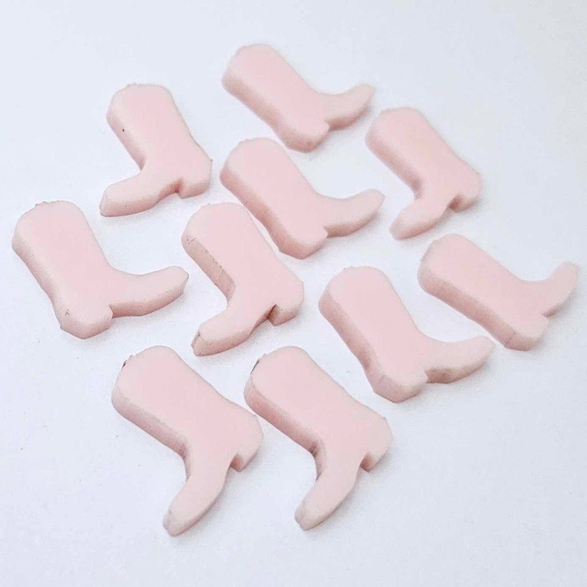 15mm strawberry milkshake pink acrylic boot stud earring blanks laid flat with a white background.