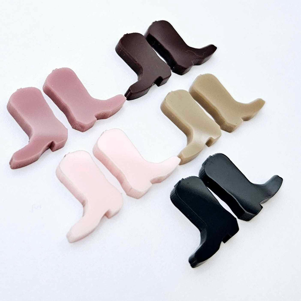 15mm solid acrylic boot stud earring blanks in strawberry milkshake, dusty rose, chocolate brown, iced coffee and black, with one pair of each colour laid flat together.