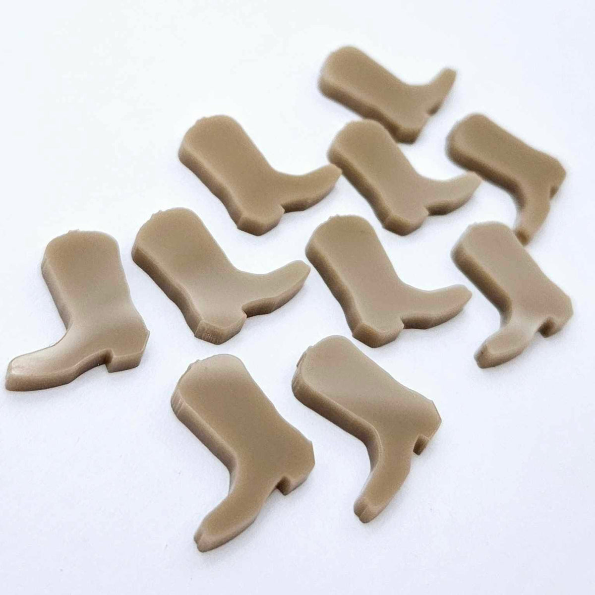 15mm iced coffee acrylic boot stud earring blanks laid flat.