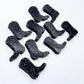 15mm holographic black glitter boot stud earring blanks laid flat together.