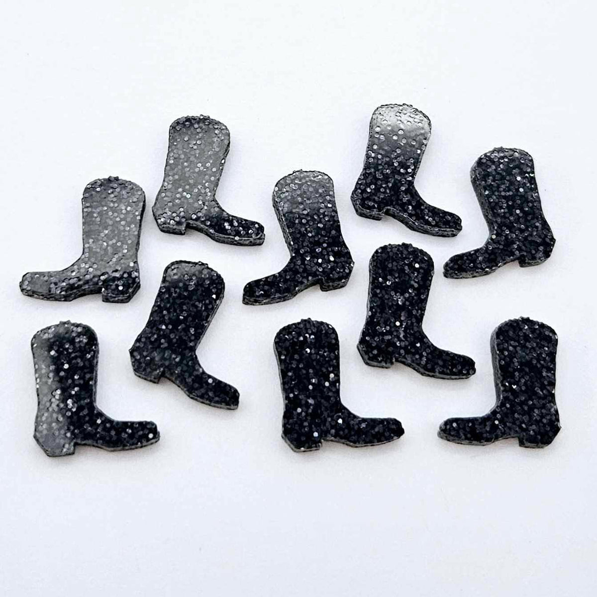 15mm holographic black glitter boot stud earring blanks laid flat together.