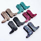 15mm glitter boot stud earring blanks in copper, black, holographic blue, hot pink and teal glitter, with one pair of each colour laid flat together.