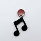 35mm black marble acrylic music note earring dangle blank assembled with a 14mm red glitter topper, showing the lightweight finished earring design.