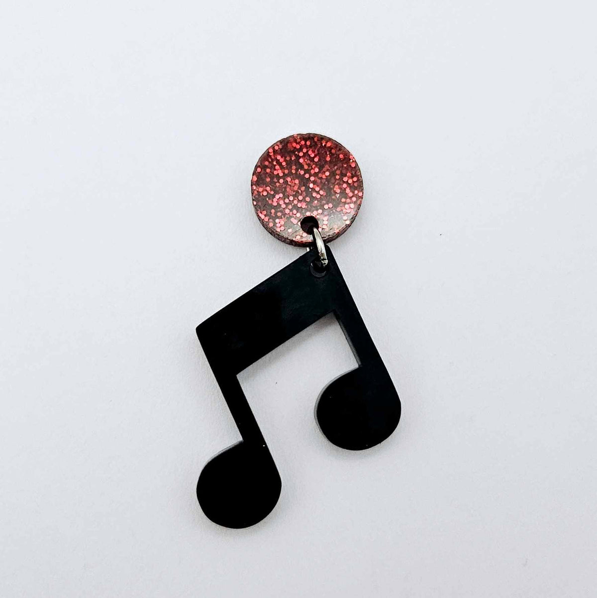 35mm black marble acrylic music note earring dangle blank assembled with a 14mm red glitter topper, showing the lightweight finished earring design.