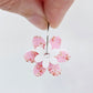 Two-piece Cherry Blossom and White UV printed acrylic flower earring blanks assembled on 20mm stainless steel hoops, showing how the floral pieces combine to create lightweight statement earrings.