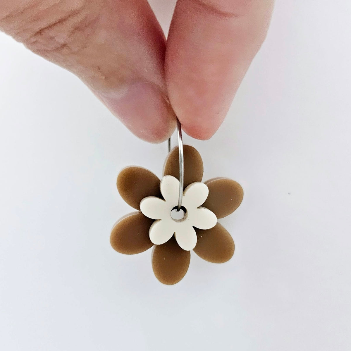 Two-piece iced coffee and cream solid colour acrylic flower earring blanks assembled on 20mm stainless steel hoop, showing how the layered floral pieces create lightweight statement earring.
