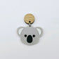 Solid grey acrylic koala dangle earring blank assembled with a 14mm Oak wooden topper, featuring black paint-filled eyes and nose with white inner ears, showing how the pieces can be combined to create a finished koala earring.