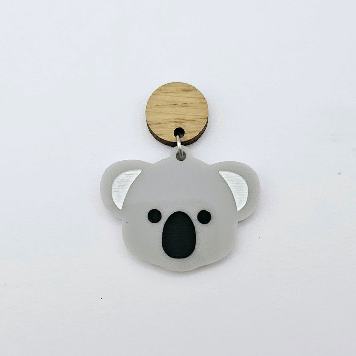 Solid grey acrylic koala dangle earring blank assembled with a 14mm Oak wooden topper, featuring black paint-filled eyes and nose with white inner ears, showing how the pieces can be combined to create a finished koala earring.