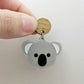 Solid grey acrylic koala dangle earring blank assembled with a 14mm Oak wooden topper, featuring black paint-filled eyes and nose with white inner ears, showing how the pieces can be combined to create a finished koala earring.