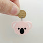 Solid strawberry milkshake pink acrylic koala dangle earring blank assembled with a 14mm Oak wooden topper, featuring black paint-filled eyes and nose with white inner ears, showing how the pieces can be combined to create a finished koala earring.