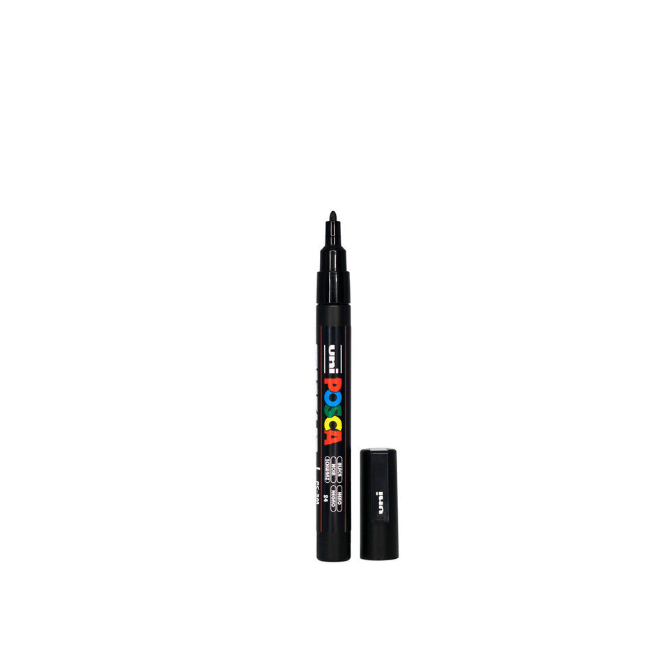 Black POSCA PC-3M fine tip paint pen used for detailed craft and earring paint fill designs